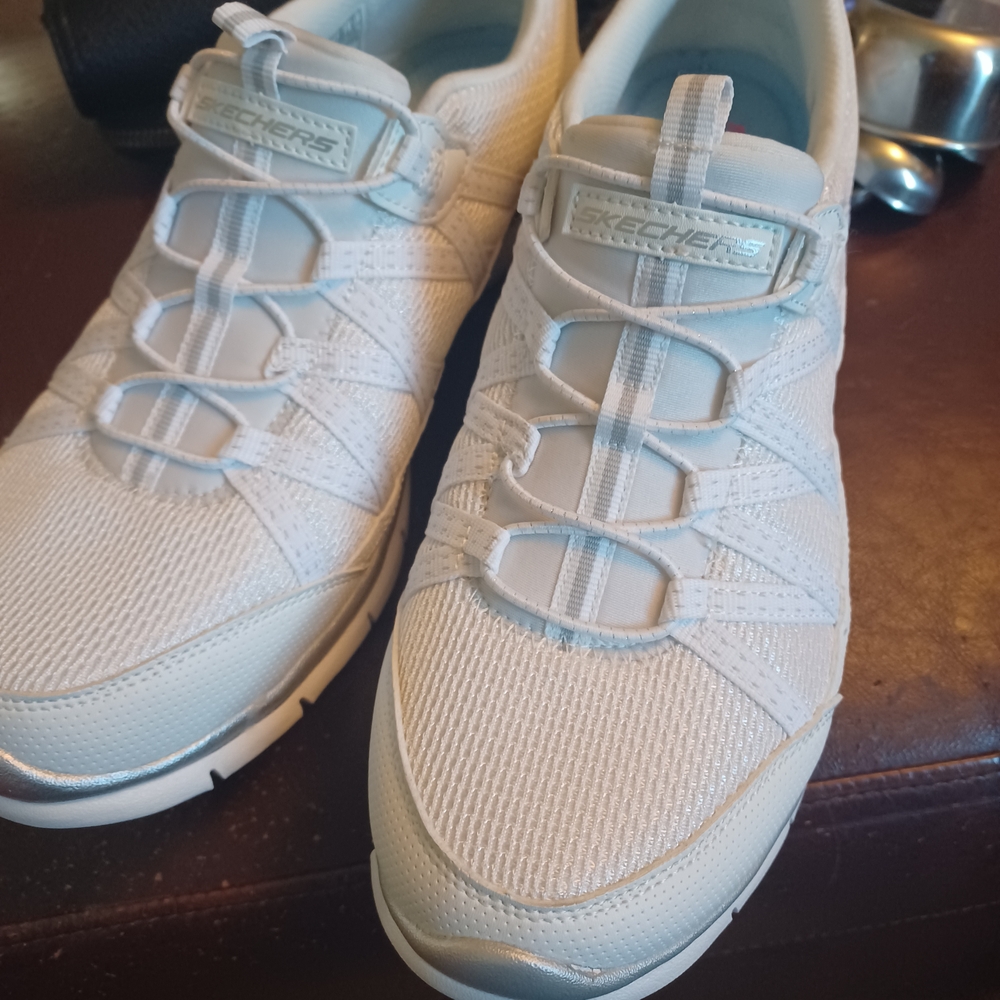 Skechers Women's White Slip-On Knit Sneakers with Silver Accents